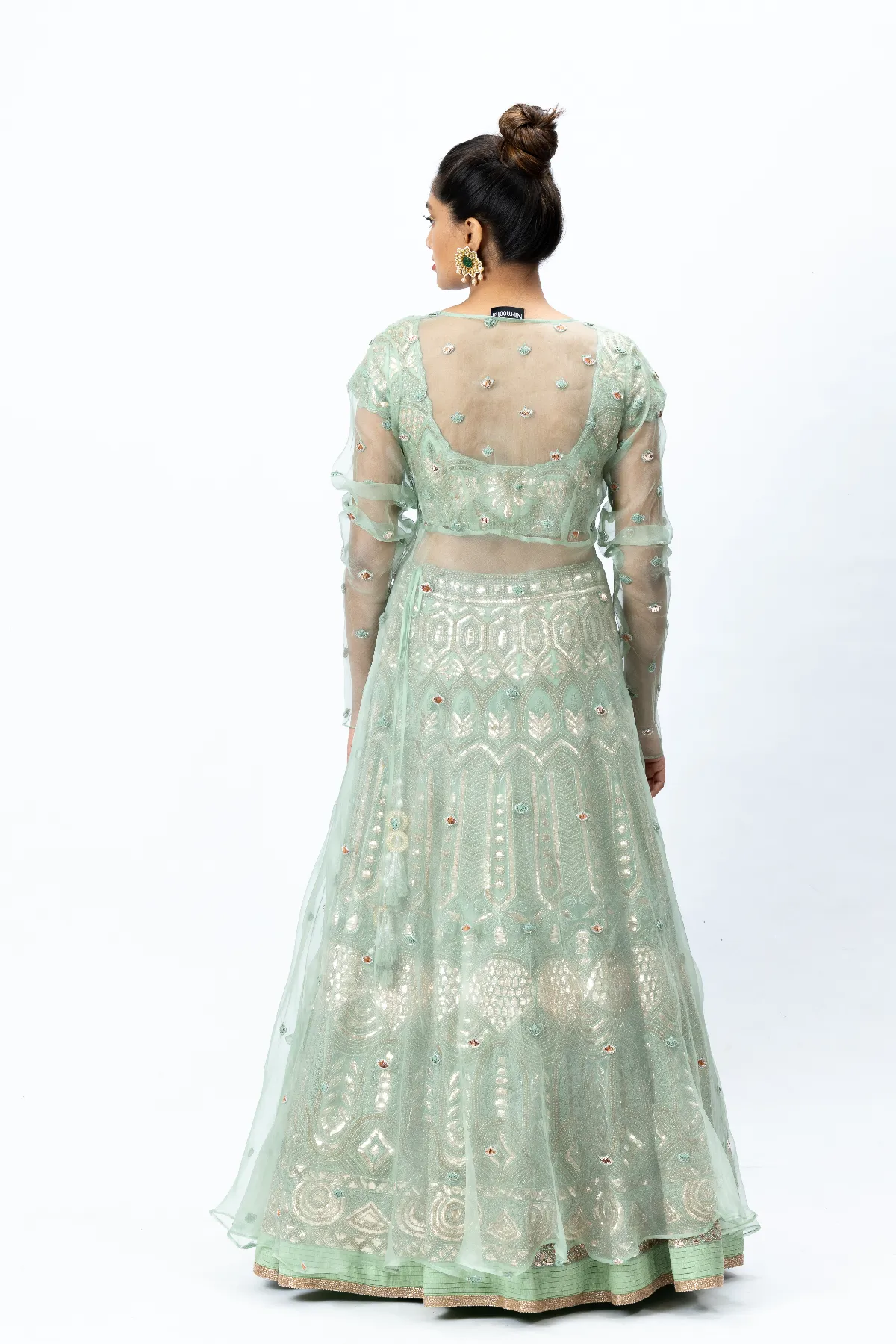 Mint Green Hand-embroidered Lehenga paired with Hand-embroidered Blouse, Hand-embroidered Dupatta and Hand-embroidered Long Jacket with Buttis